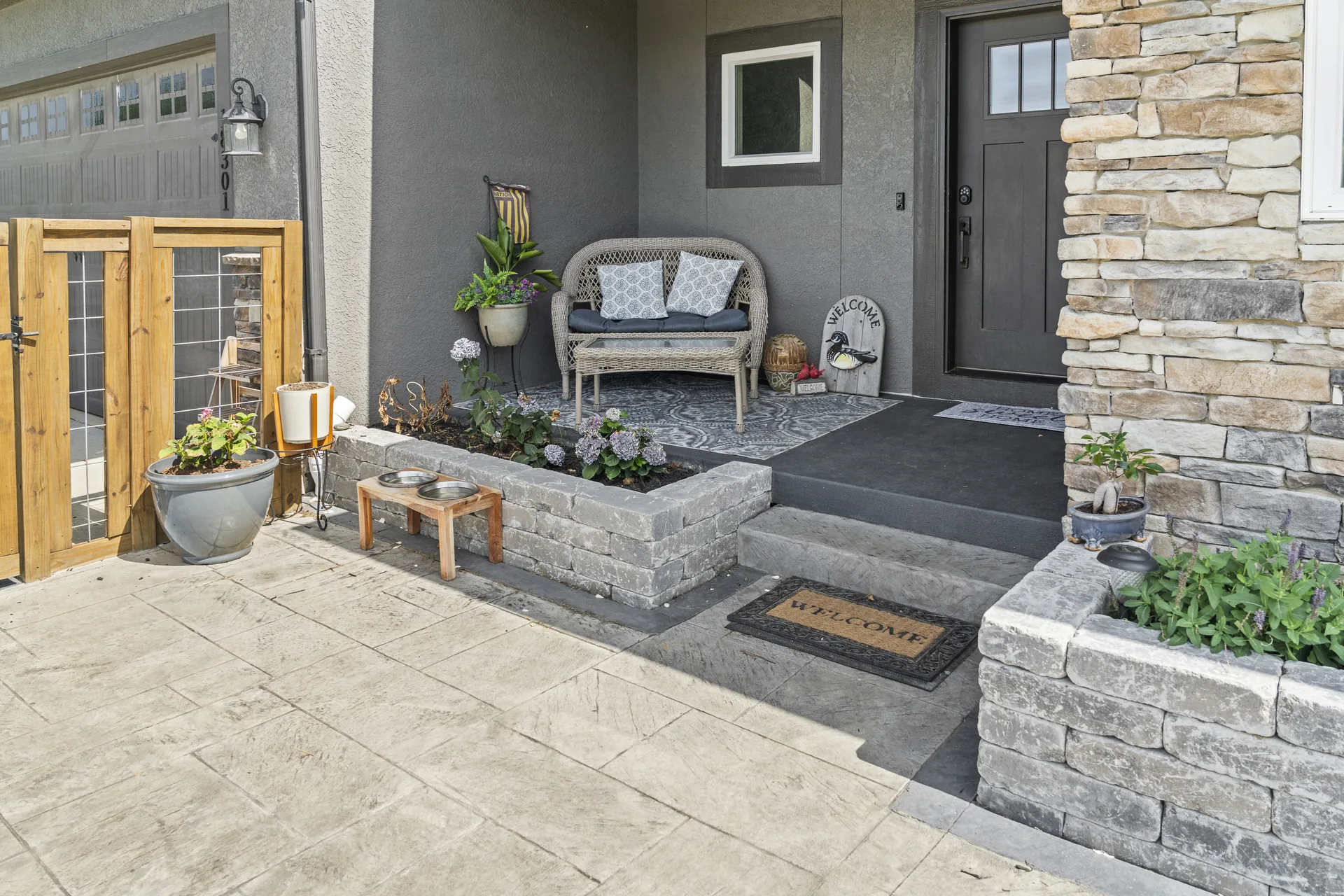Grill and raised planting beds along the home