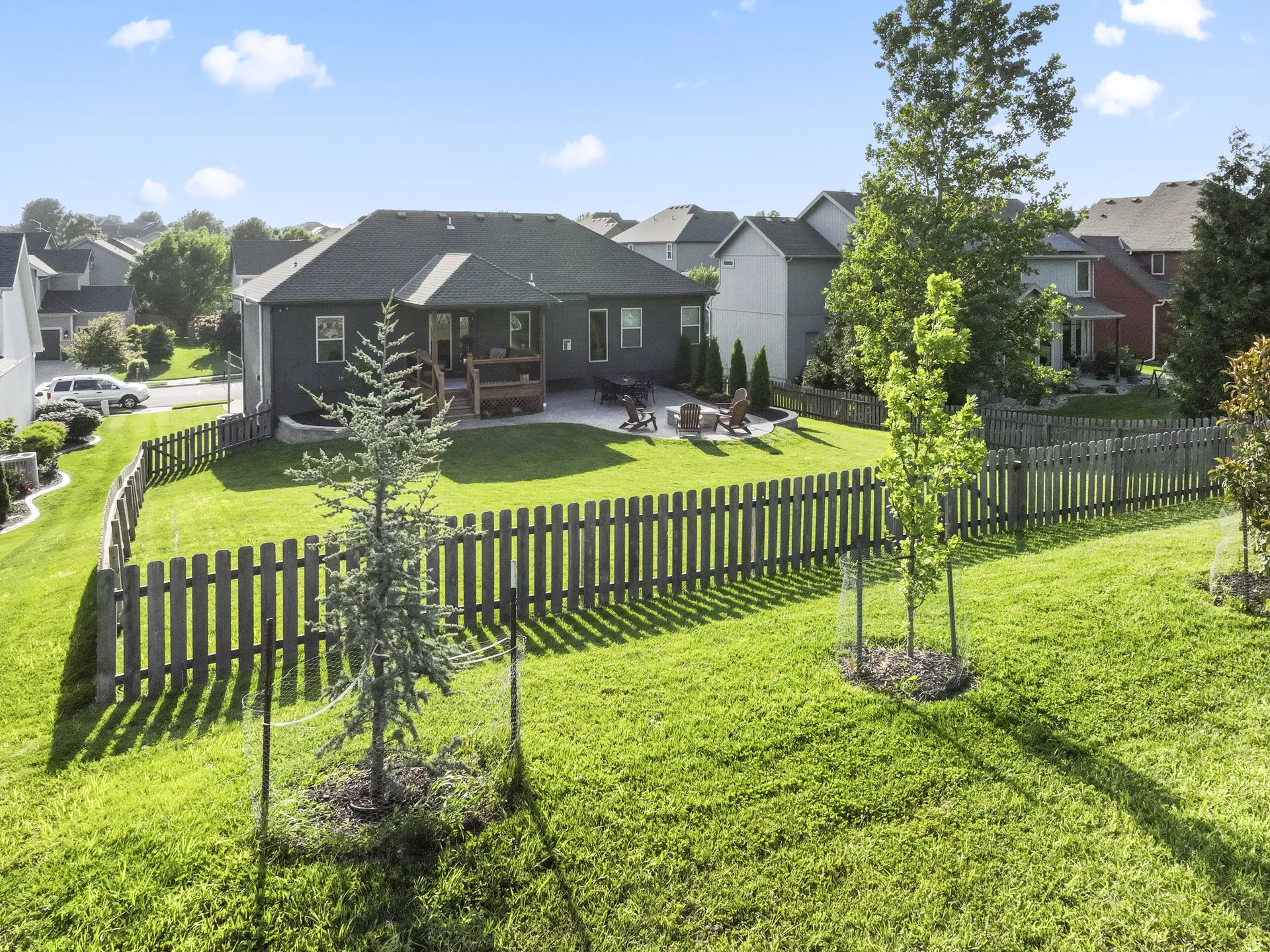 Aerial perspective on the lawn, fence and patio