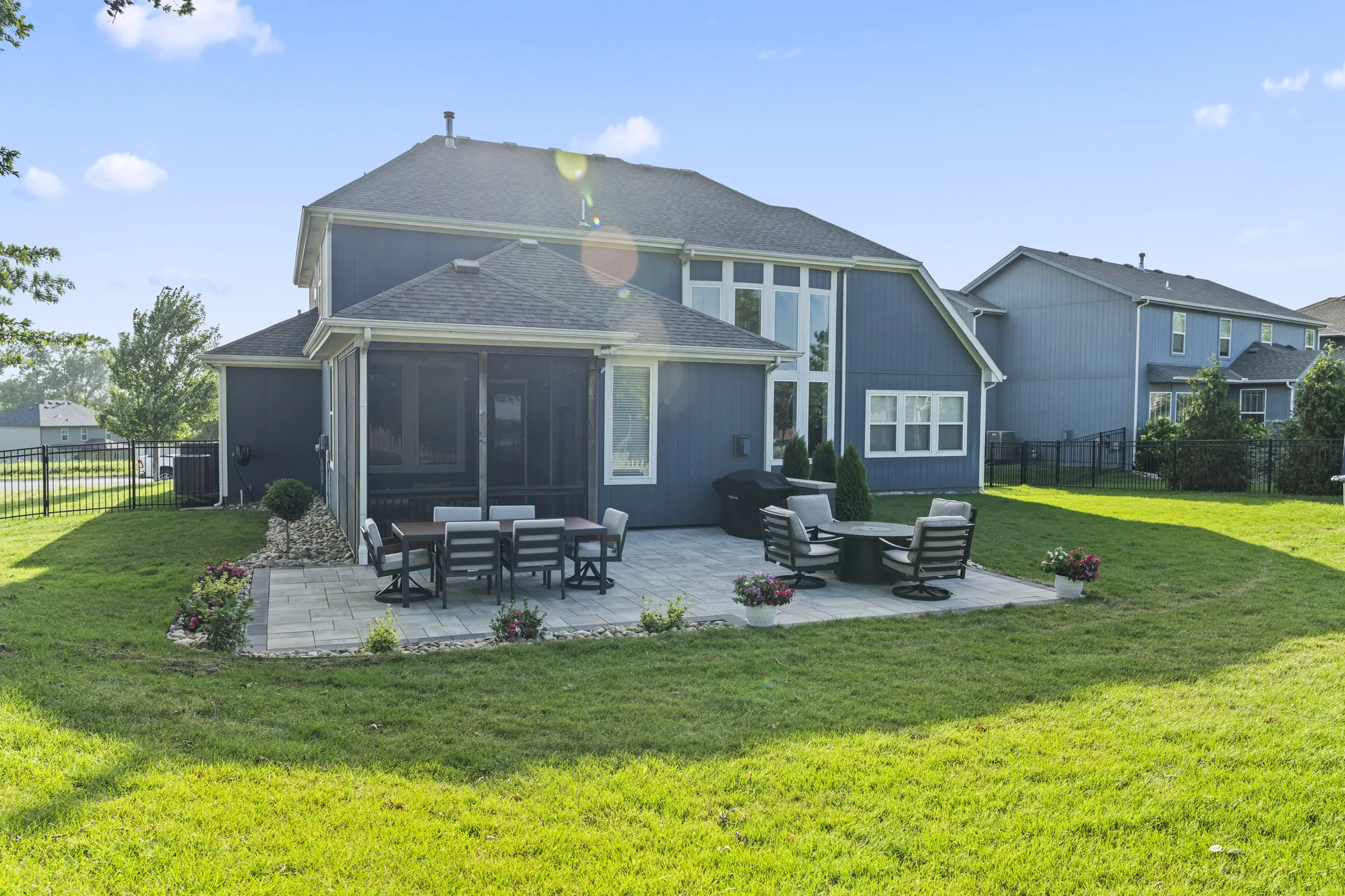 Ground-level view of the patio and covered outdoor area