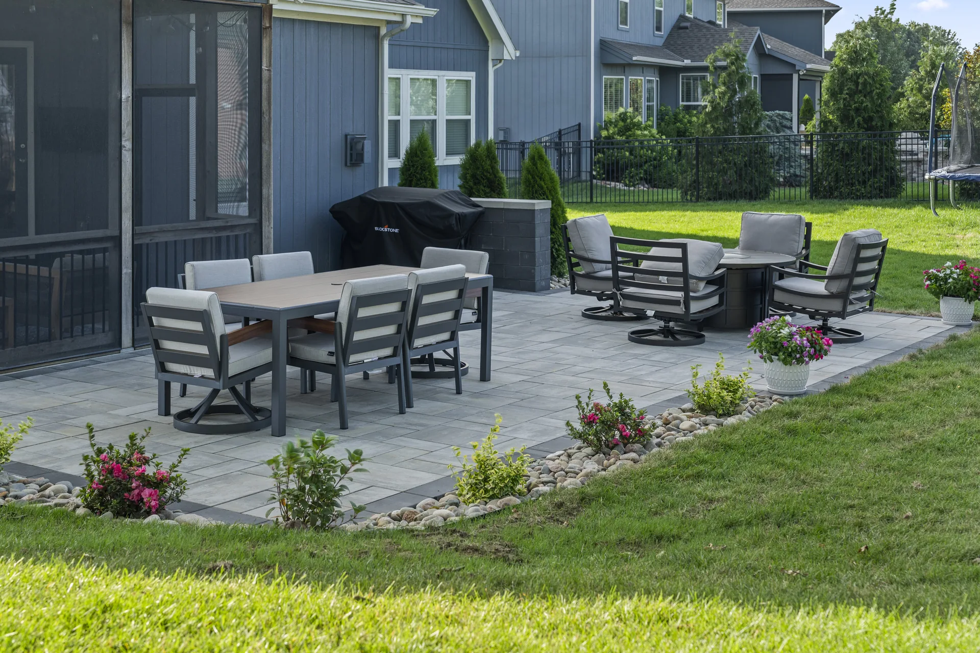 Outdoor dining set and seating on the pavers