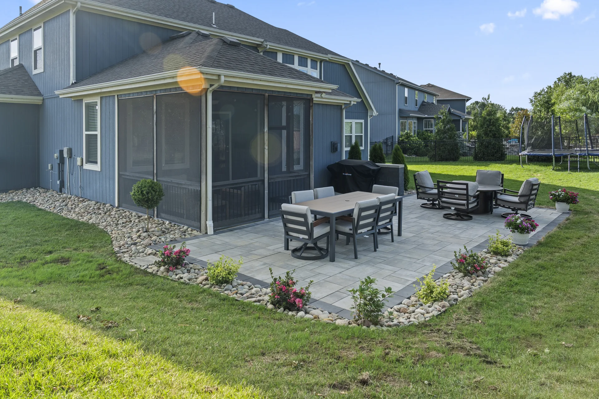 Side view of the dining area and stone-edged bed
