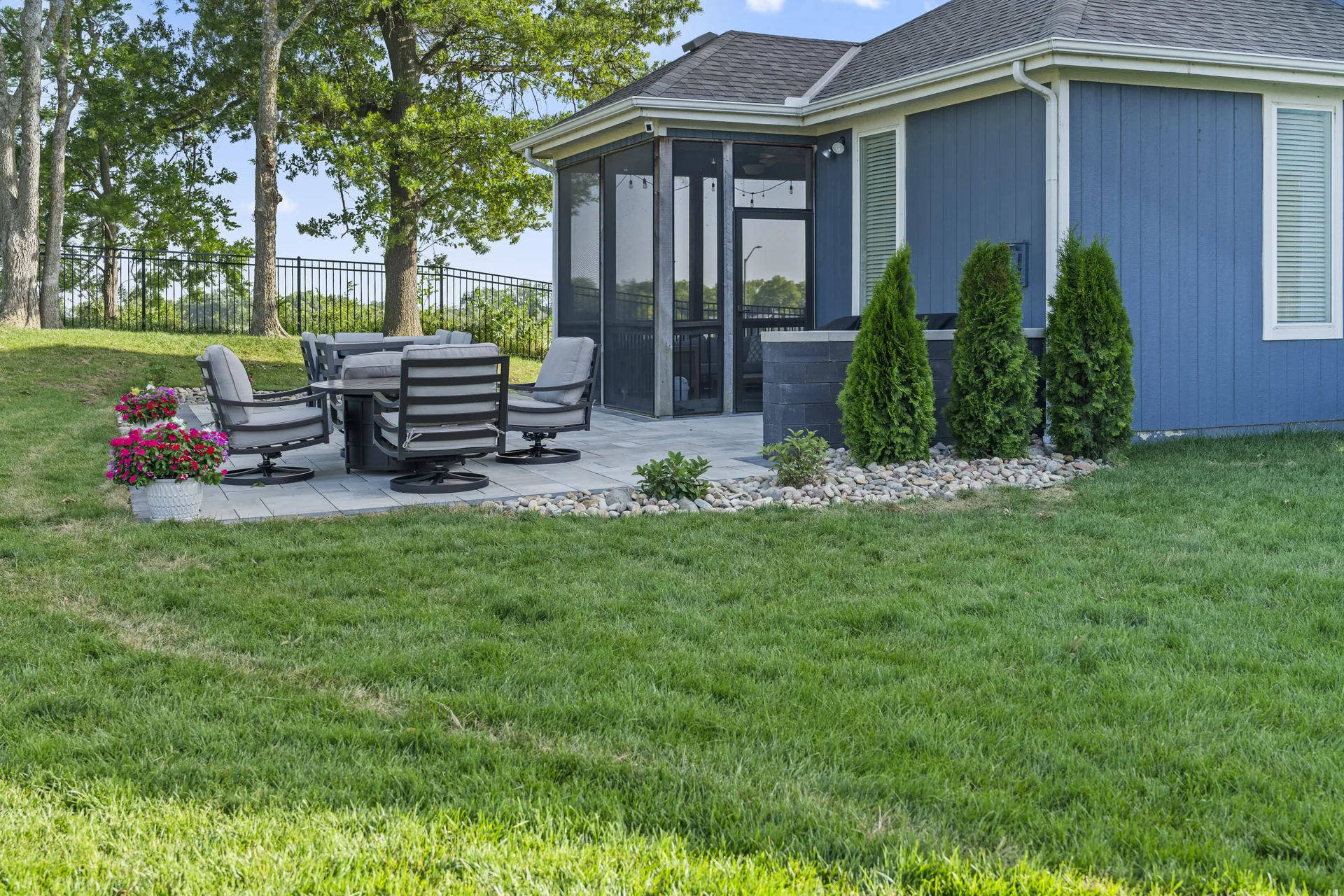 Patio seating in front of the planted border
