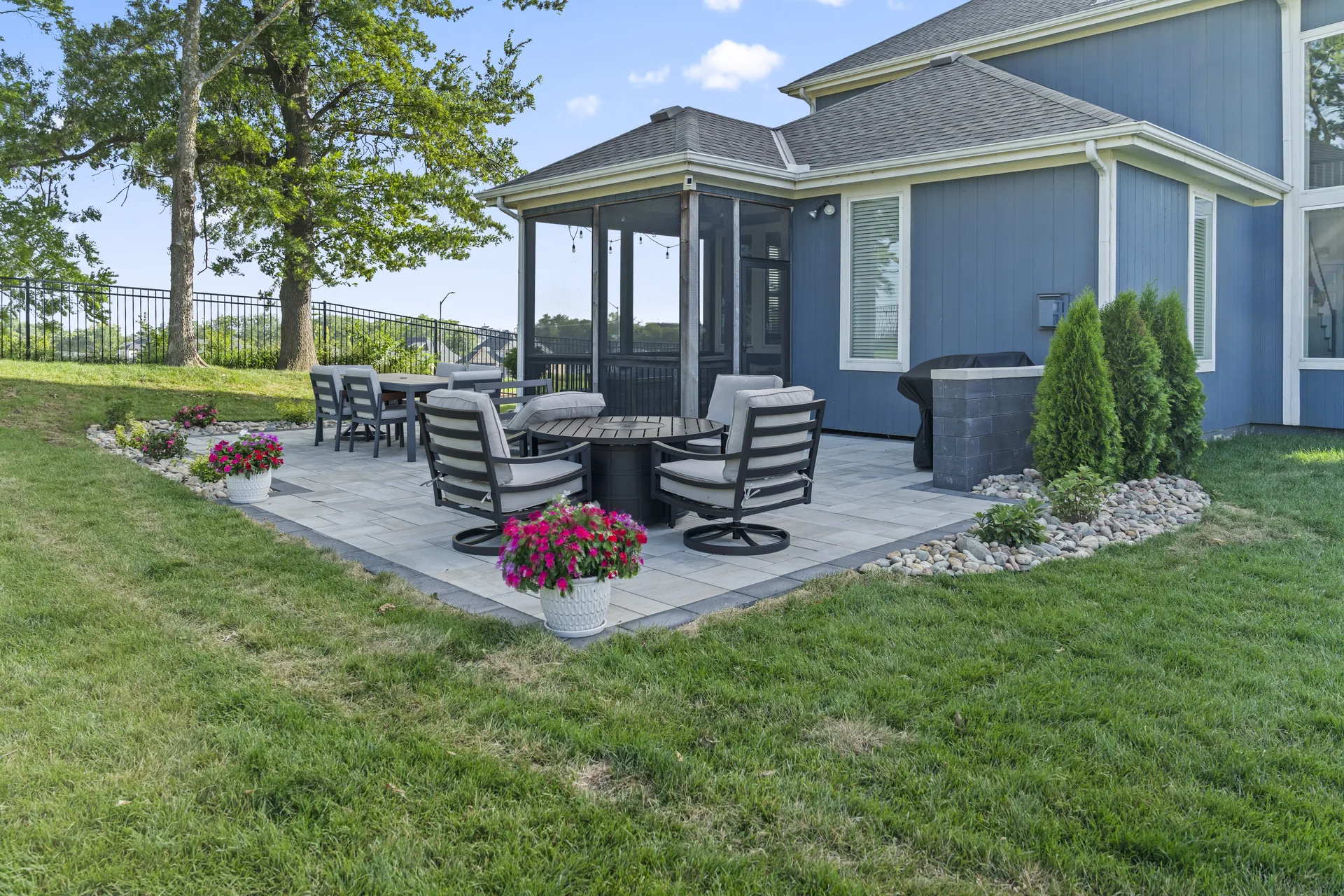 Large-format pavers and lawn-facing patio edge