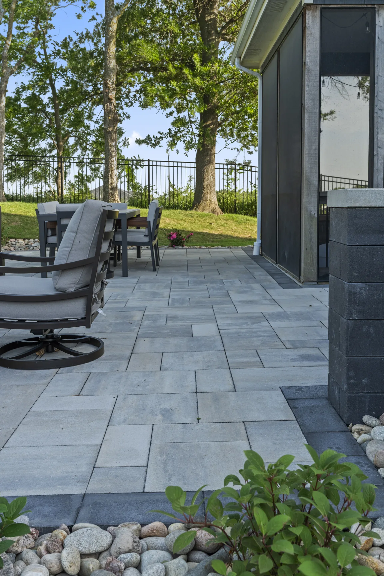 Close view of the paver walkway beside the house