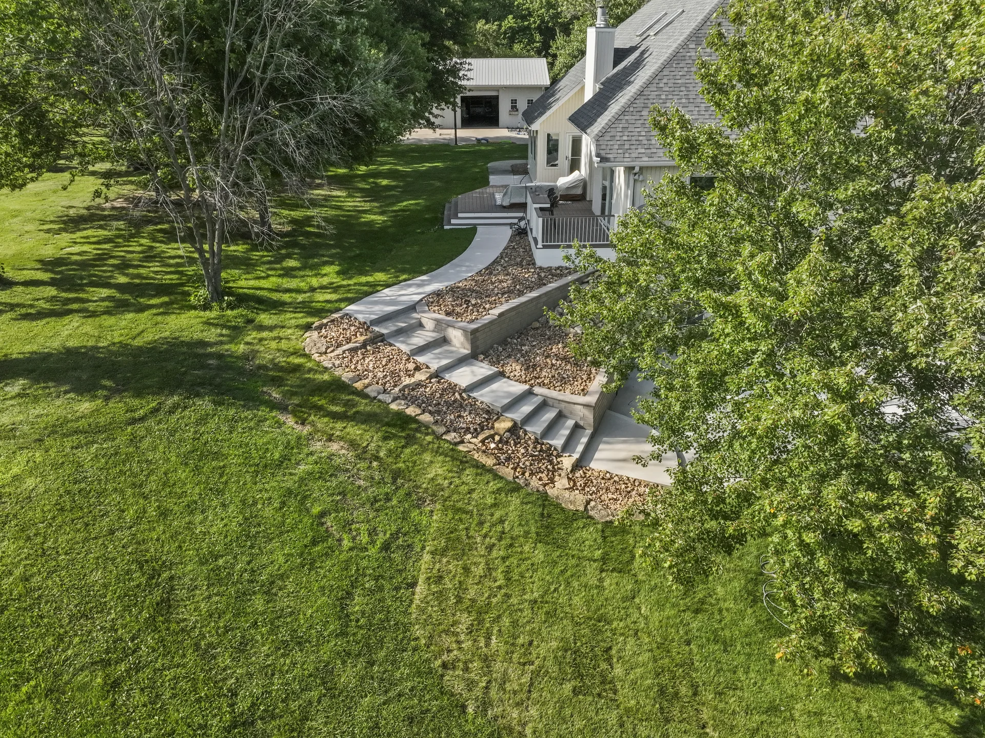 Angled aerial view of the retaining walls along the home