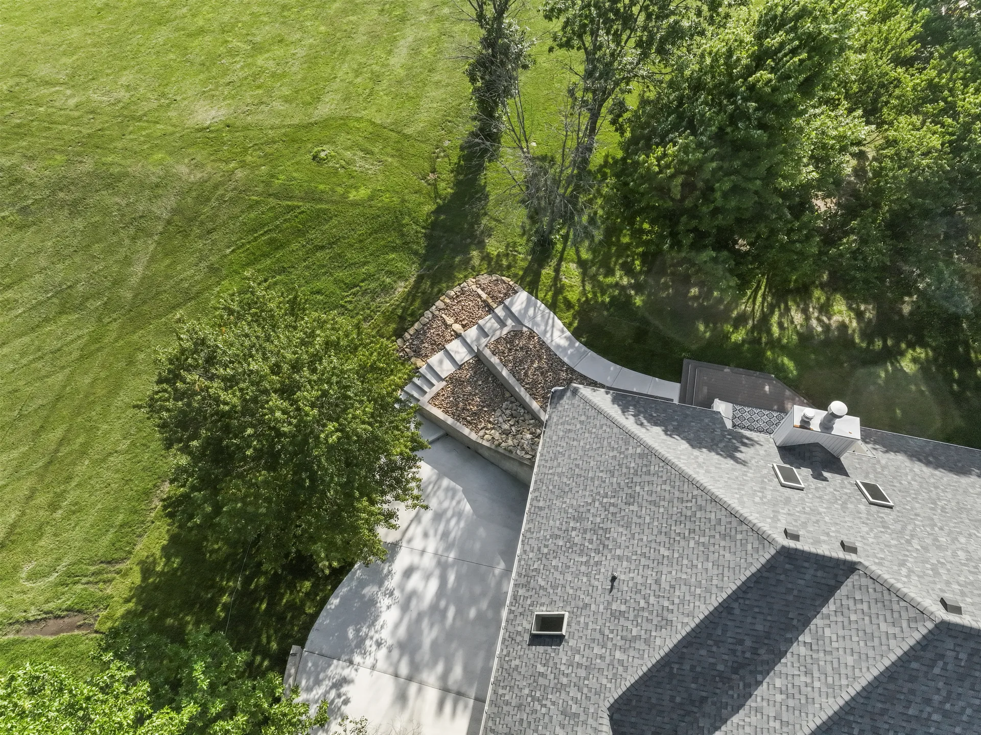 Aerial perspective of the curved walls and steps