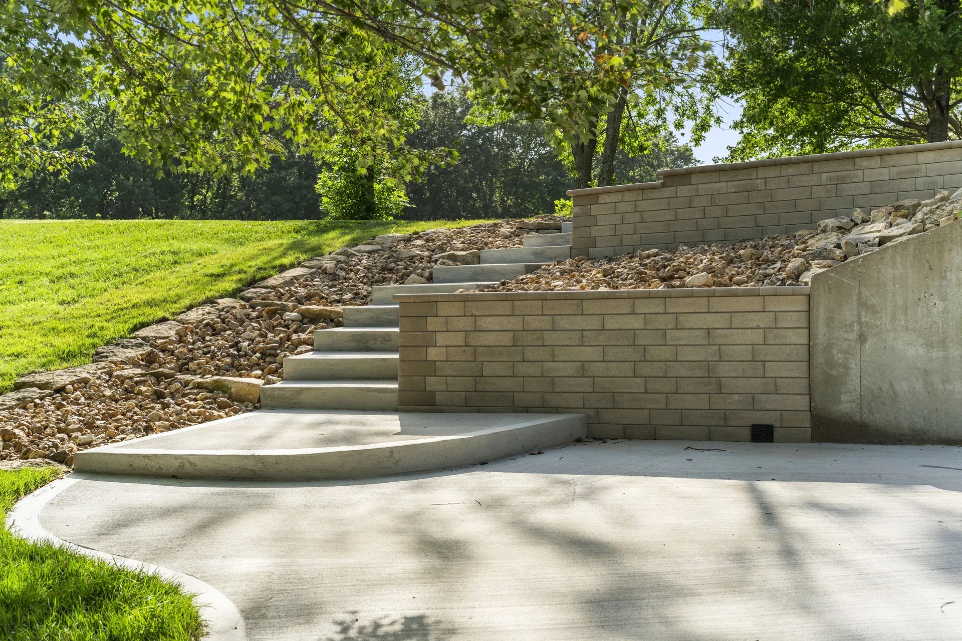 Stairway connecting the patio to the higher lawn