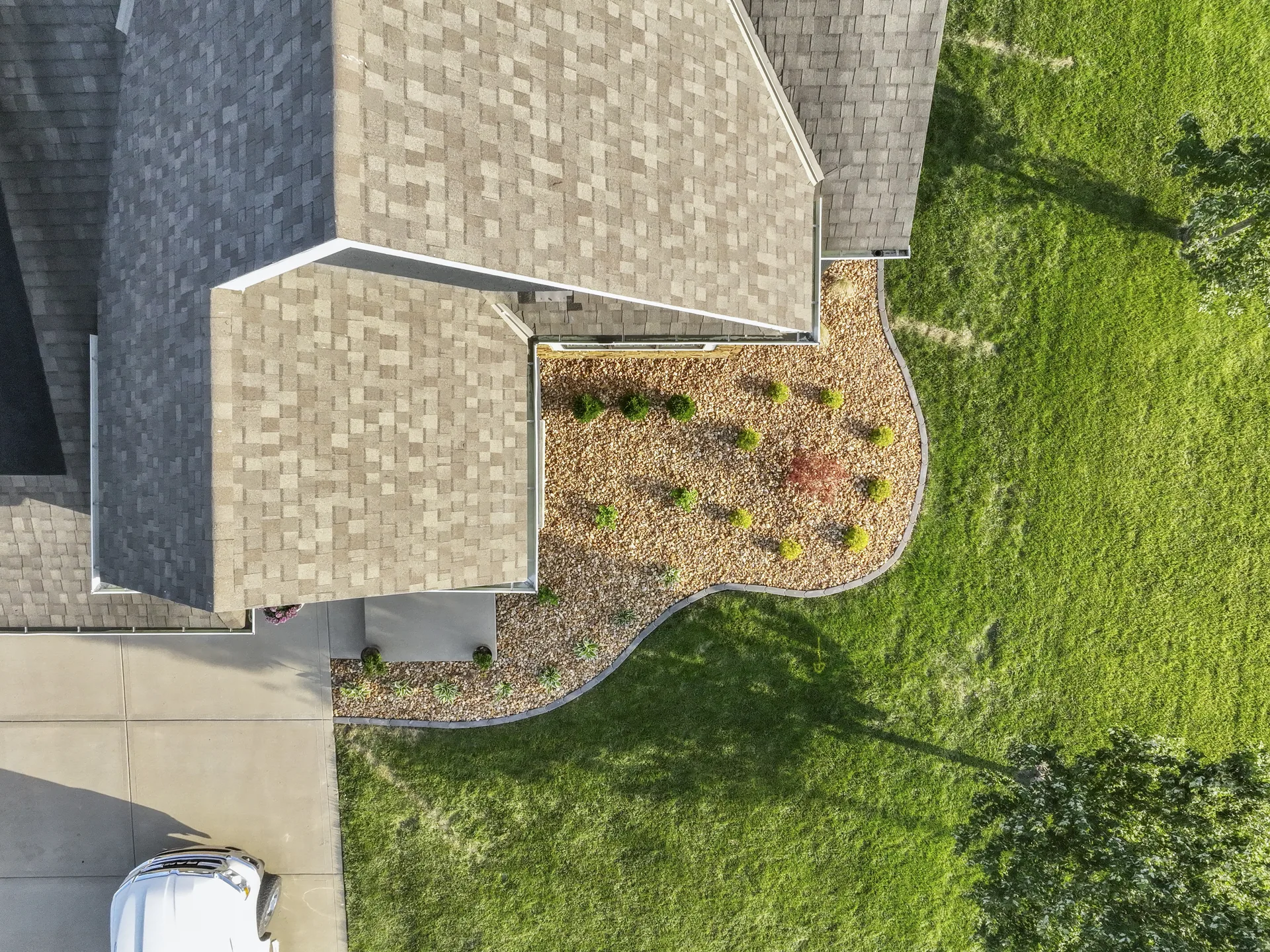 Overhead view of the home and entry landscaping