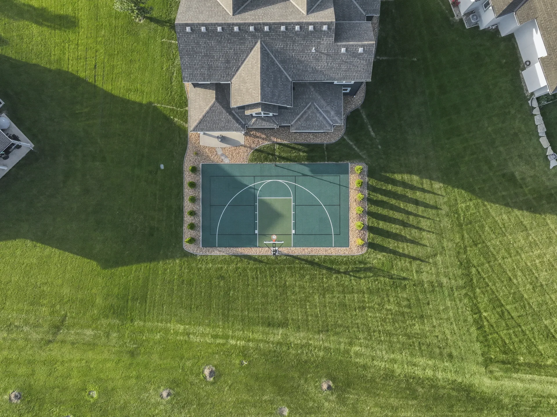 Aerial view of the marked court and surrounding lawn