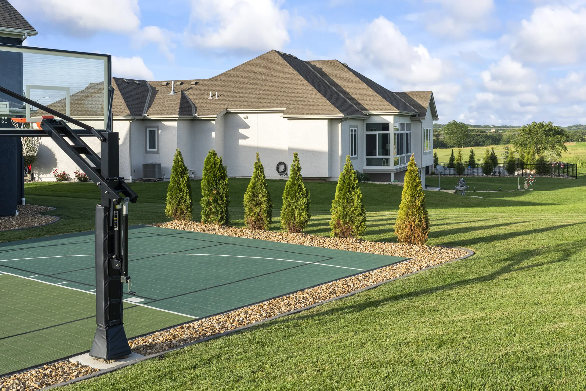 Basketball hoop and court surface from ground level