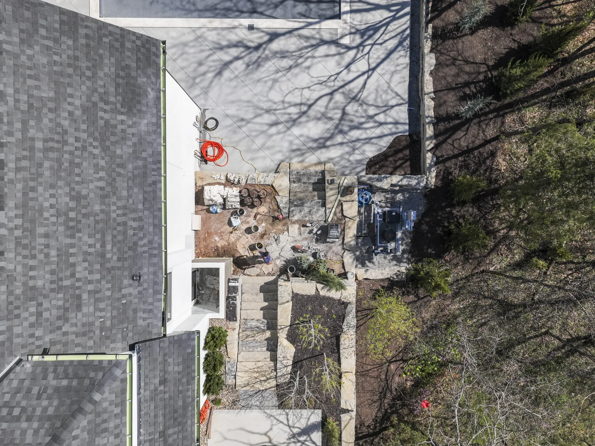 Aerial view connecting the house to the patio layout