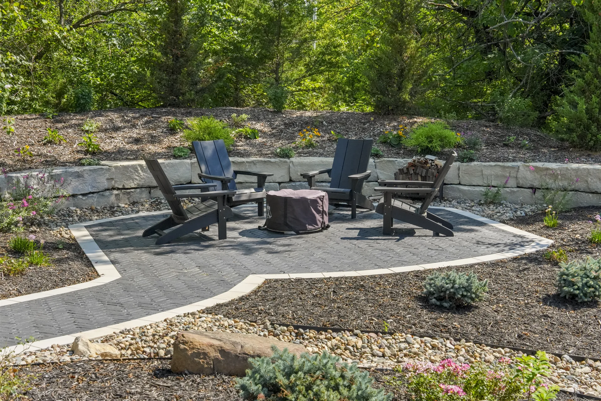 Outdoor chairs on the circular paver gathering area