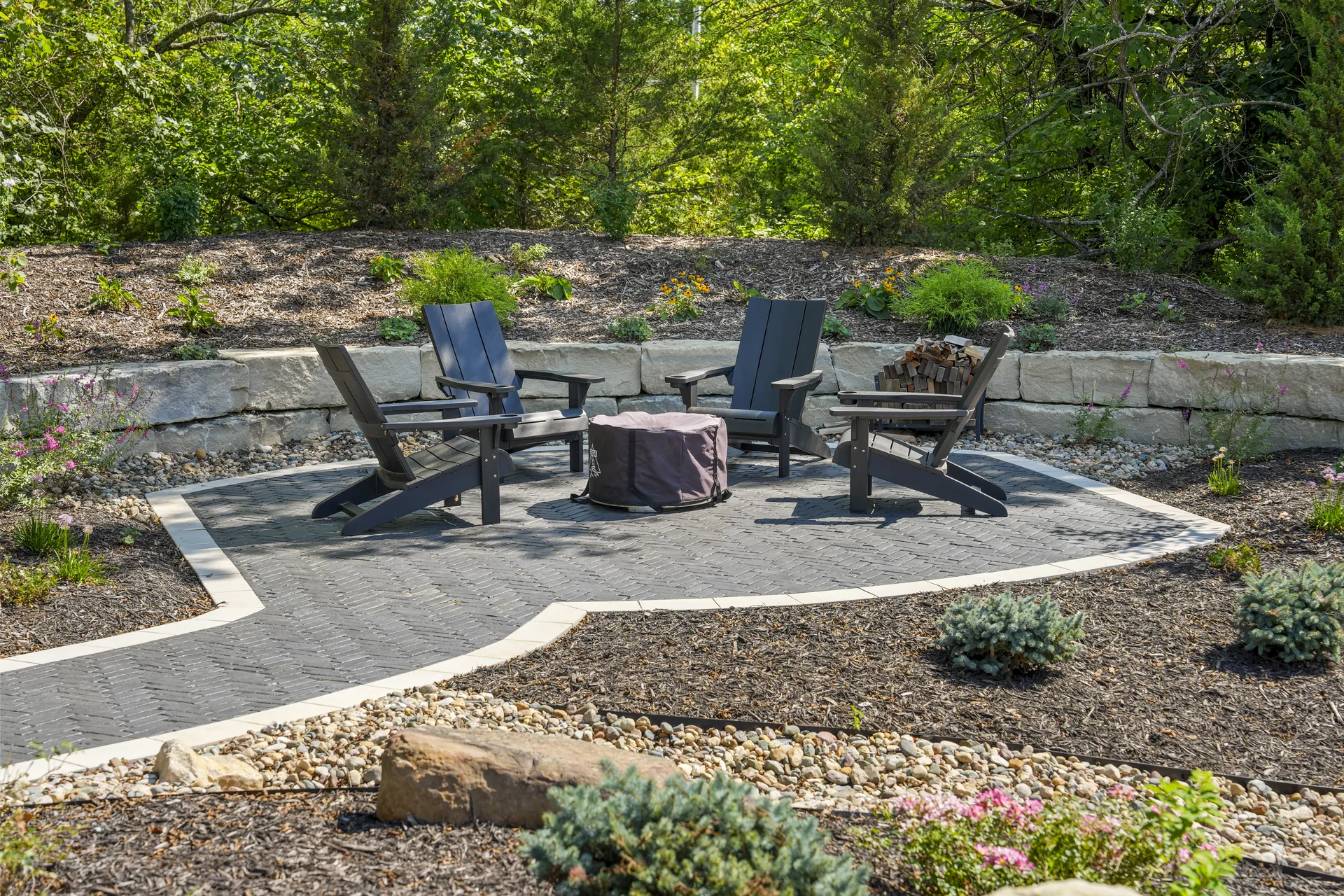 Curved walkway leading toward the patio seating
