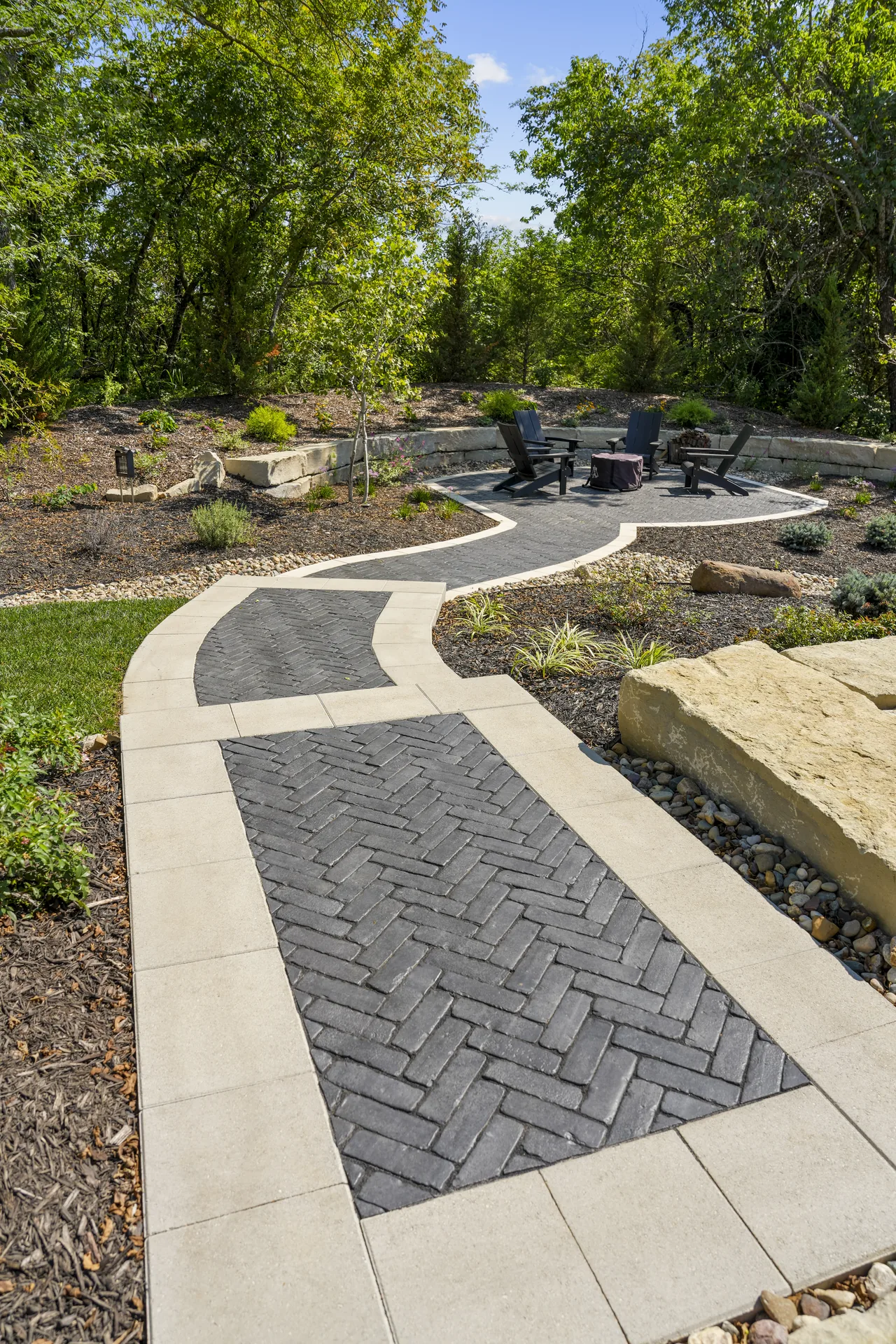 Winding walkway connecting sections of the yard
