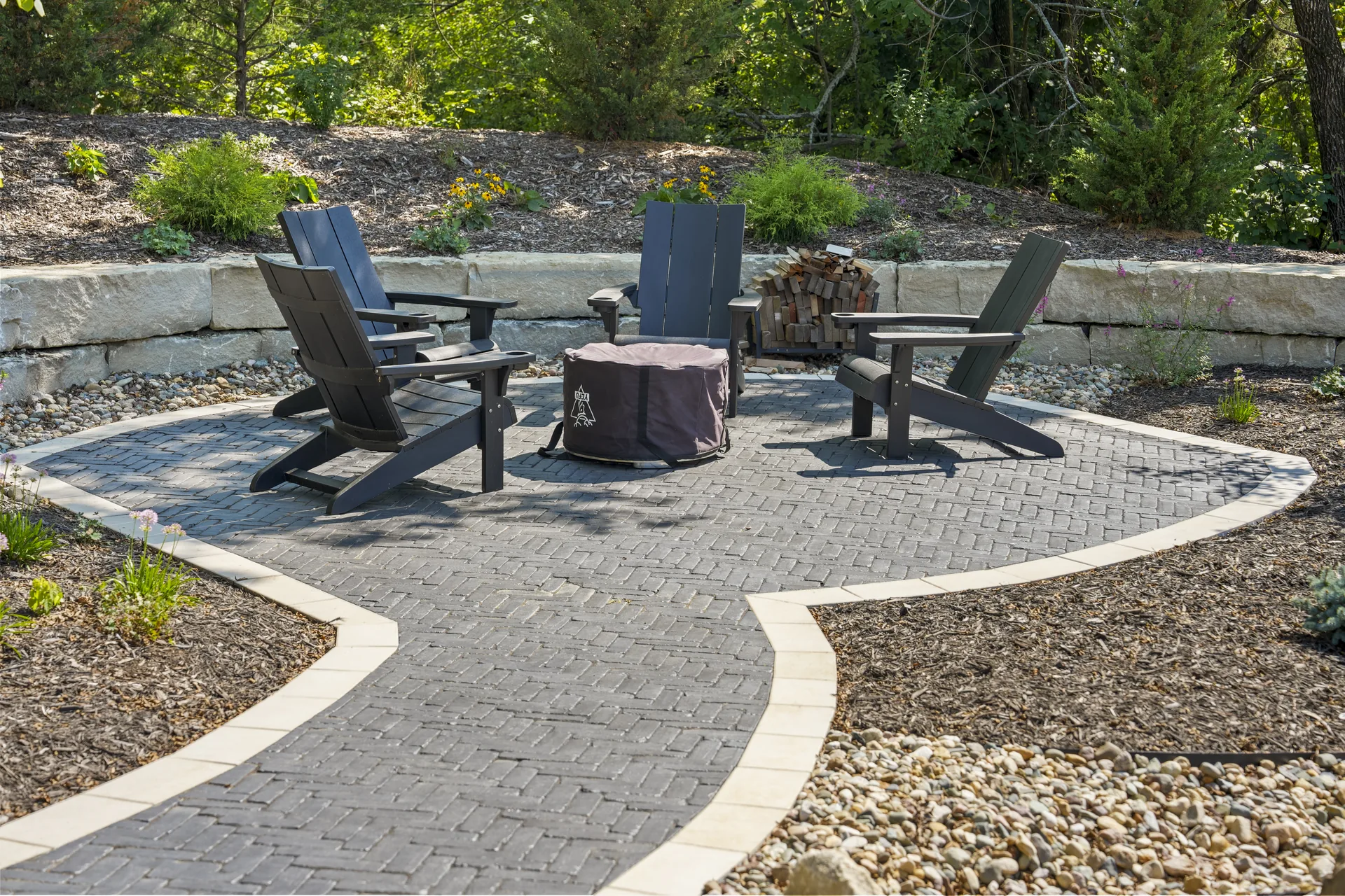 Patio seating framed by a contrasting paver border